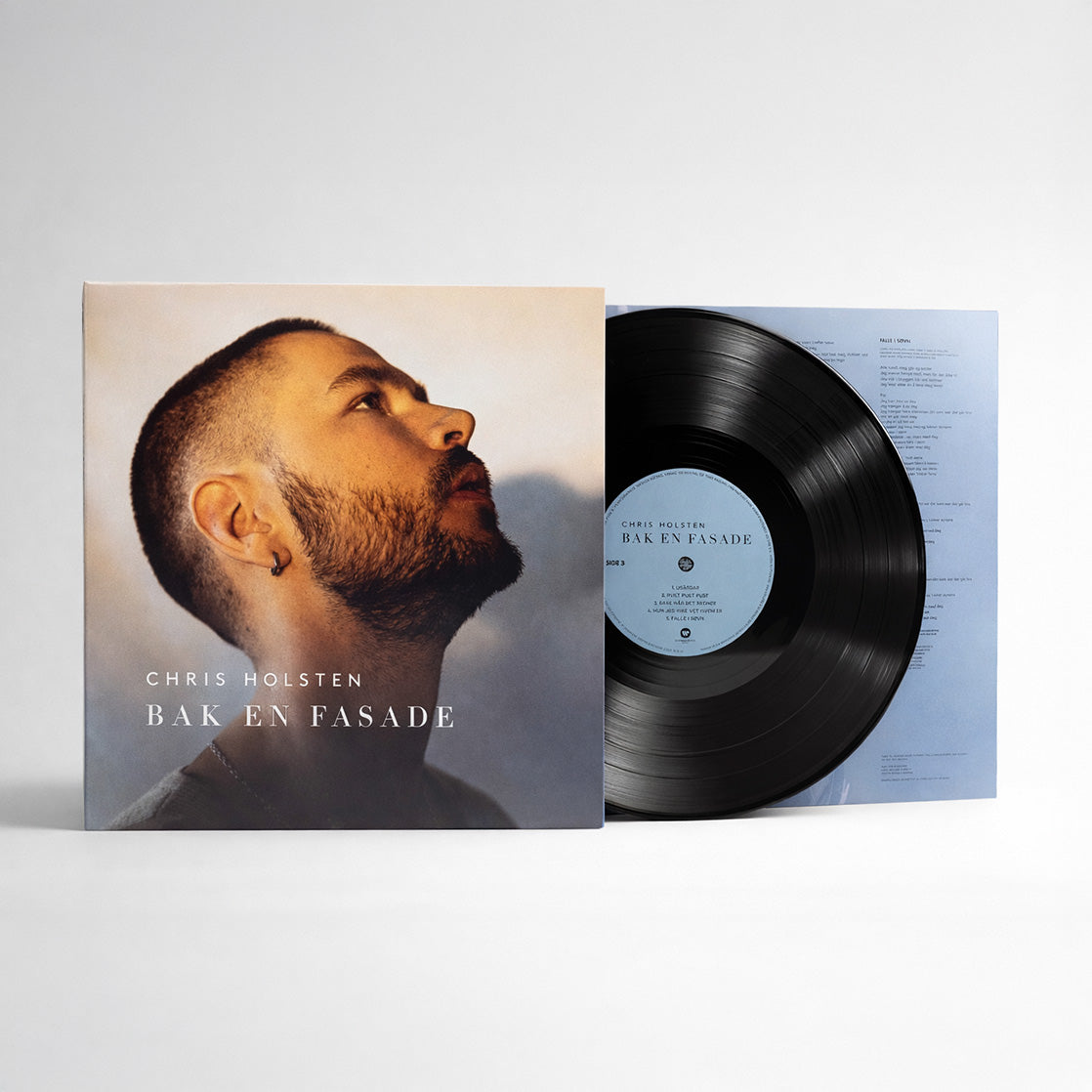 Behind A Facade (VINYL) Signed